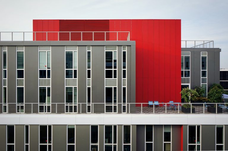 aerial photography of red and gray building